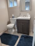 New vanity, fixtures, toilet and dual pane window